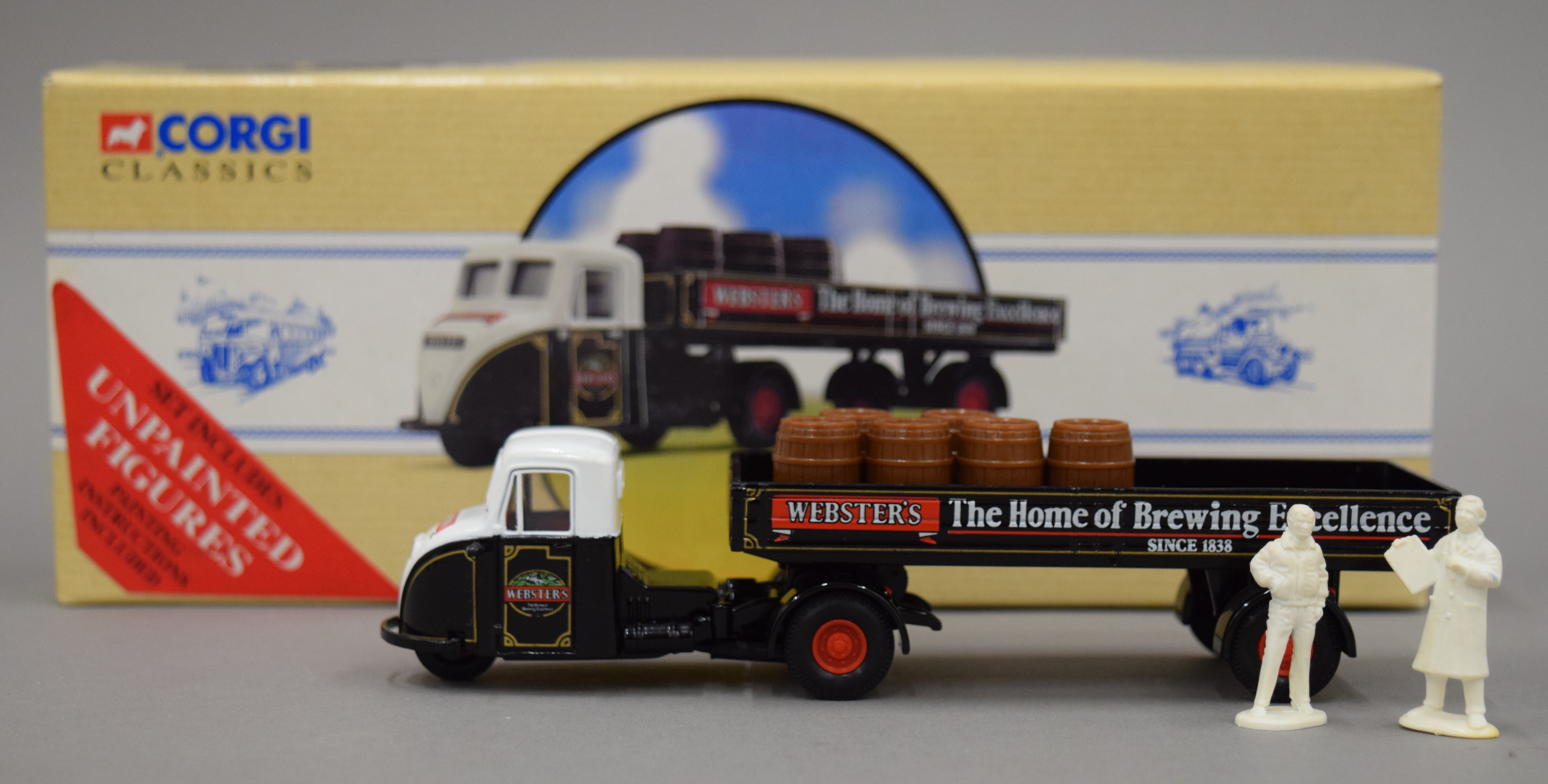 A Corgi Classics Scammel Scarab three-wheeler cab and trailer badges Webster's brewery.