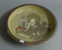 A large Satsuma bowl decorated with a figure and calligraphy. 36.5 cm diameter.