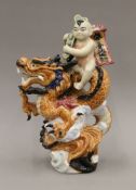 A Chinese porcelain figure. 31.5 cm high.