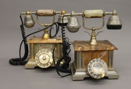 Two vintage onyx telephones.