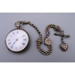 An 800 silver pocket watch and chain. Watch 4 cm diameter, chain 21 cm long.