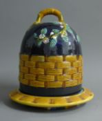 A majolica cheese dome. 32 cm high.