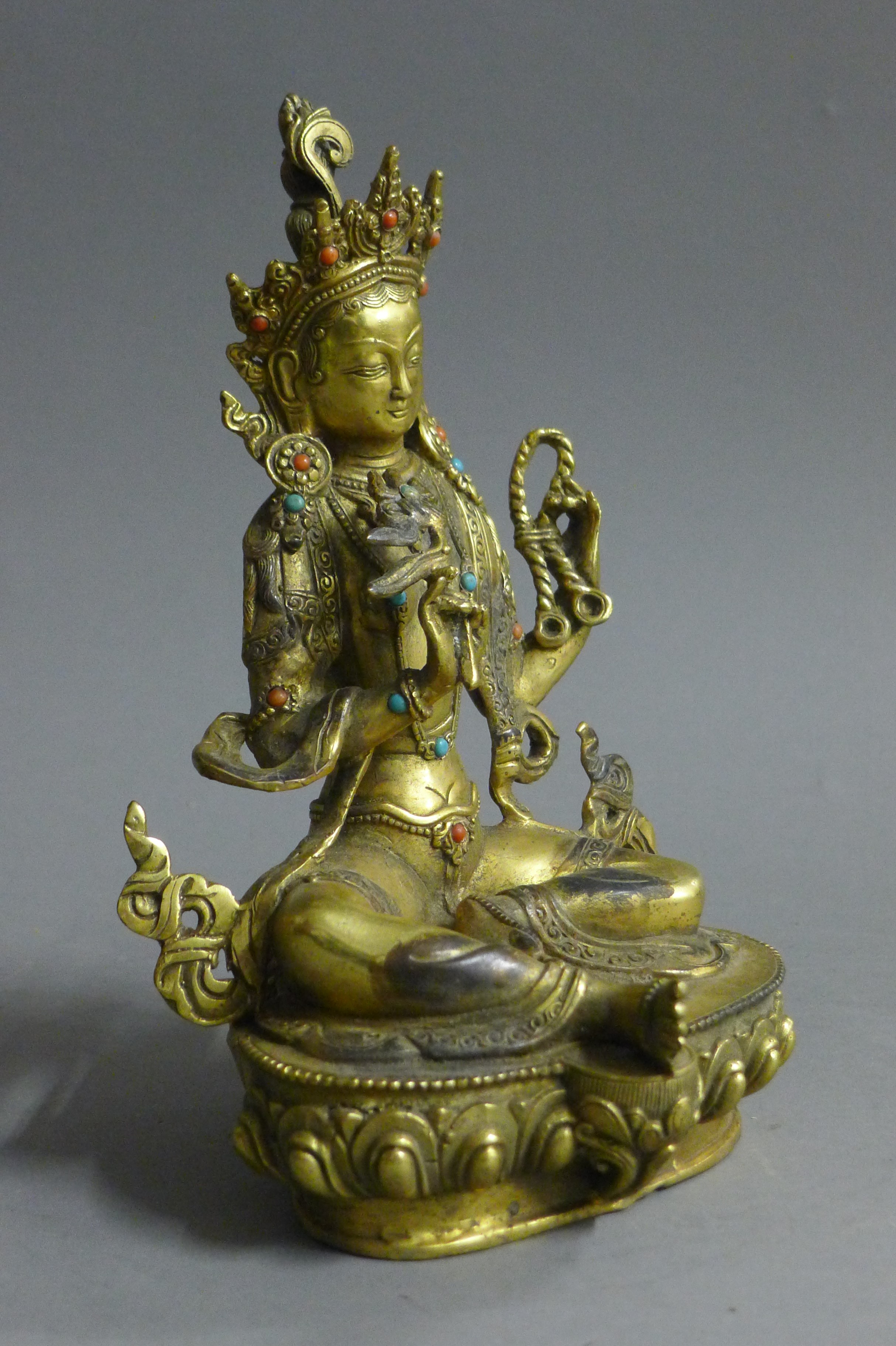 A gilt bronze figure of Buddha decorated with turquoise and coral. 21.5 cm high. - Image 3 of 5