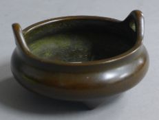 A small Chinese bronze censer. 9 cm diameter.