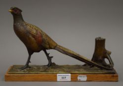 An early 20th century pheasant form table lighter. 31 cm long.