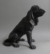 A large bronze model of a dog. 36 cm high.