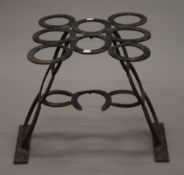 A side table made from horseshoes.