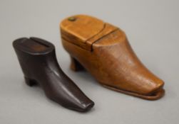 Two treen shoe shaped snuff boxes. The largest 9.5 cm long.