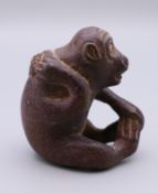 A netsuke in the form of a monkey. 4 cm high.