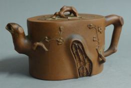 A Chinese Yixing teapot. 19 cm long.