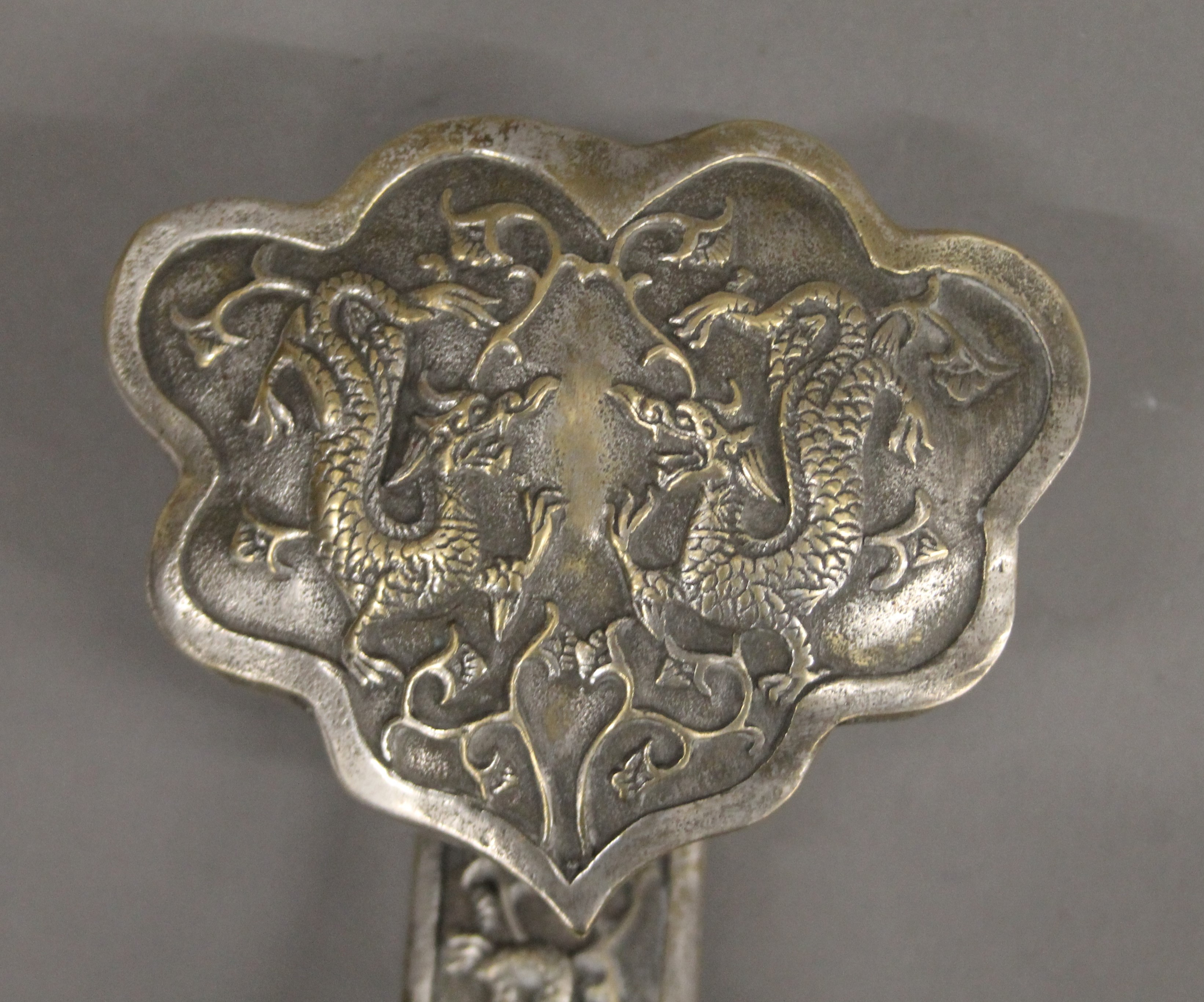 A Chinese silvered bronze ruyi sceptre. 35.5 cm long. - Image 2 of 4