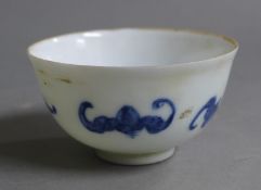 A Chinese porcelain blue and white tea bowl. 8 cm diameter.