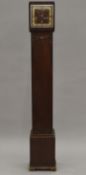 An early 20th century oak cased Westminster chime grandmother clock. 152 cm high.