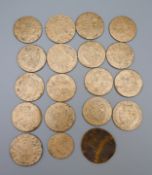 Nineteen gaming tokens. Mostly approximately 2.5 cm diameter.