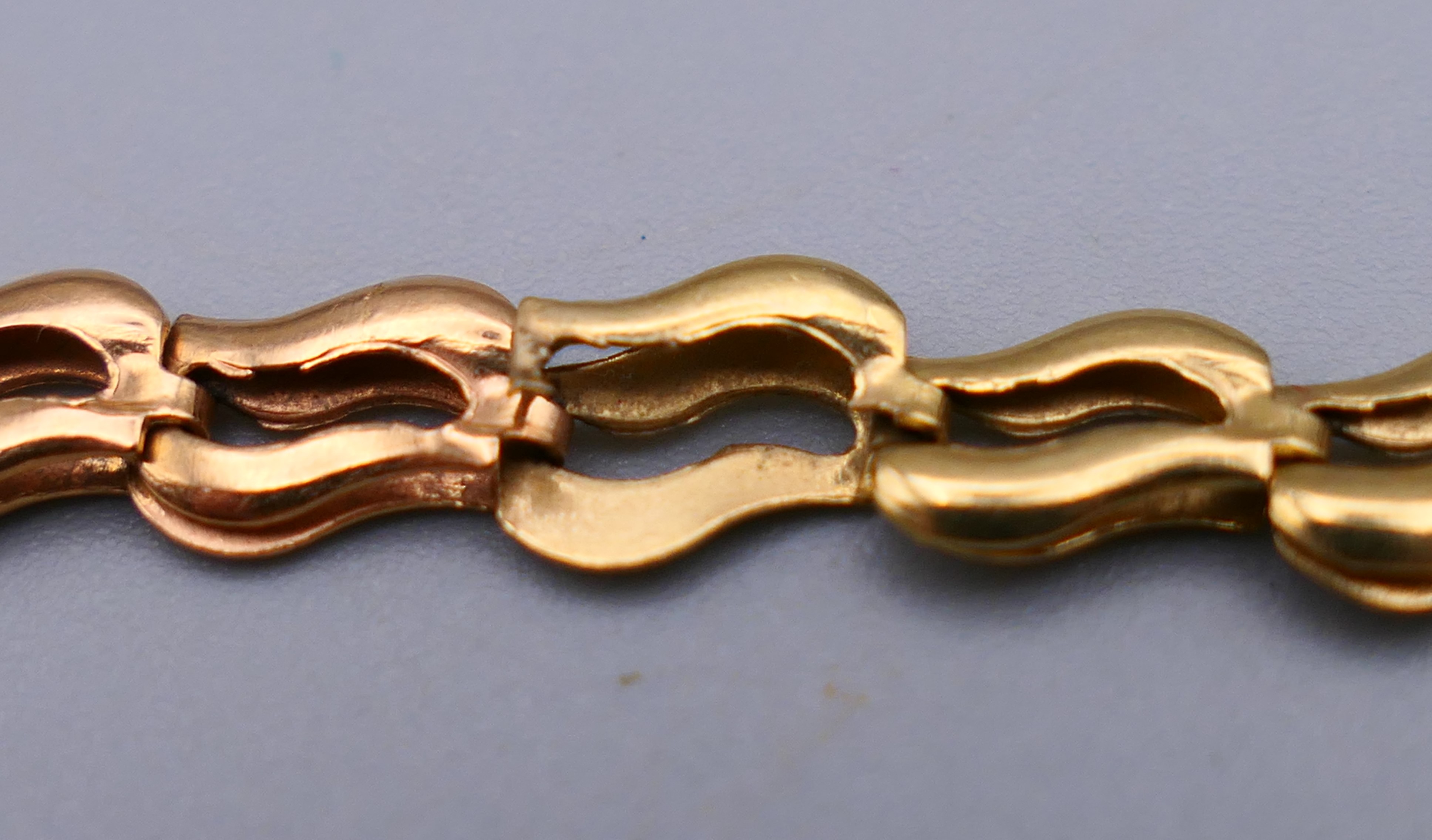 A 9 ct gold bracelet and another gold bracelet, possibly 18 ct gold. 19 cm long and 17 cm long. - Image 9 of 9