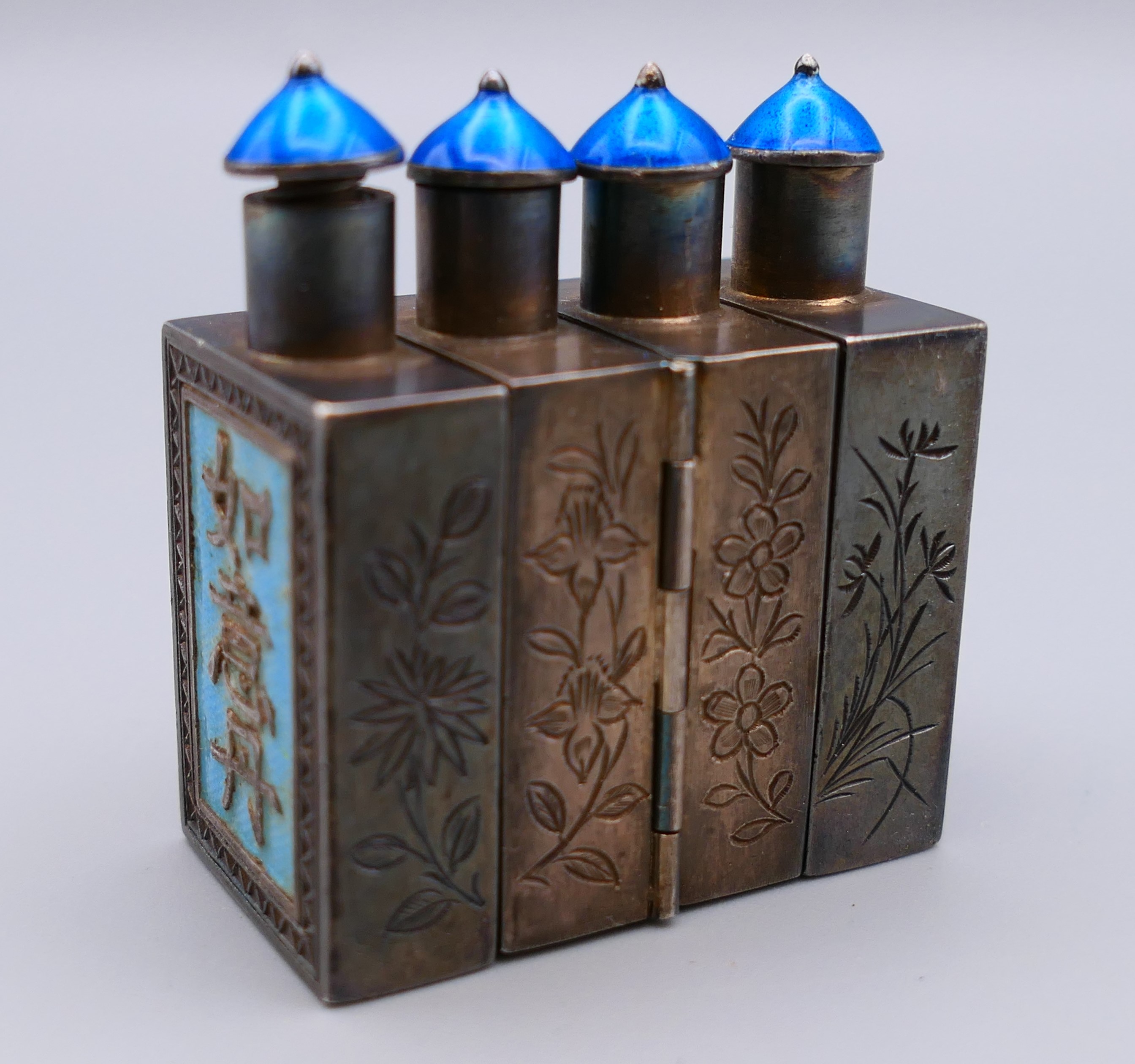 A set of four Chinese silver and enamel folding hinged snuff bottles. 4 cm high, 8 cm long opened. - Image 4 of 9