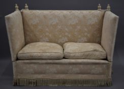 A Knowle sofa. 175 cm wide.