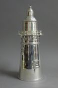 A lighthouse form cocktail shaker. 35 cm high.