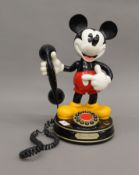 A Mickey Mouse novelty telephone. 37 cm high.