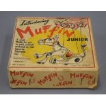 A vintage Muffin Junior in original box. The box 14.5 cm square.