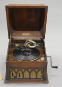 A Lloyds oak cased gramophone. 37 cm wide.