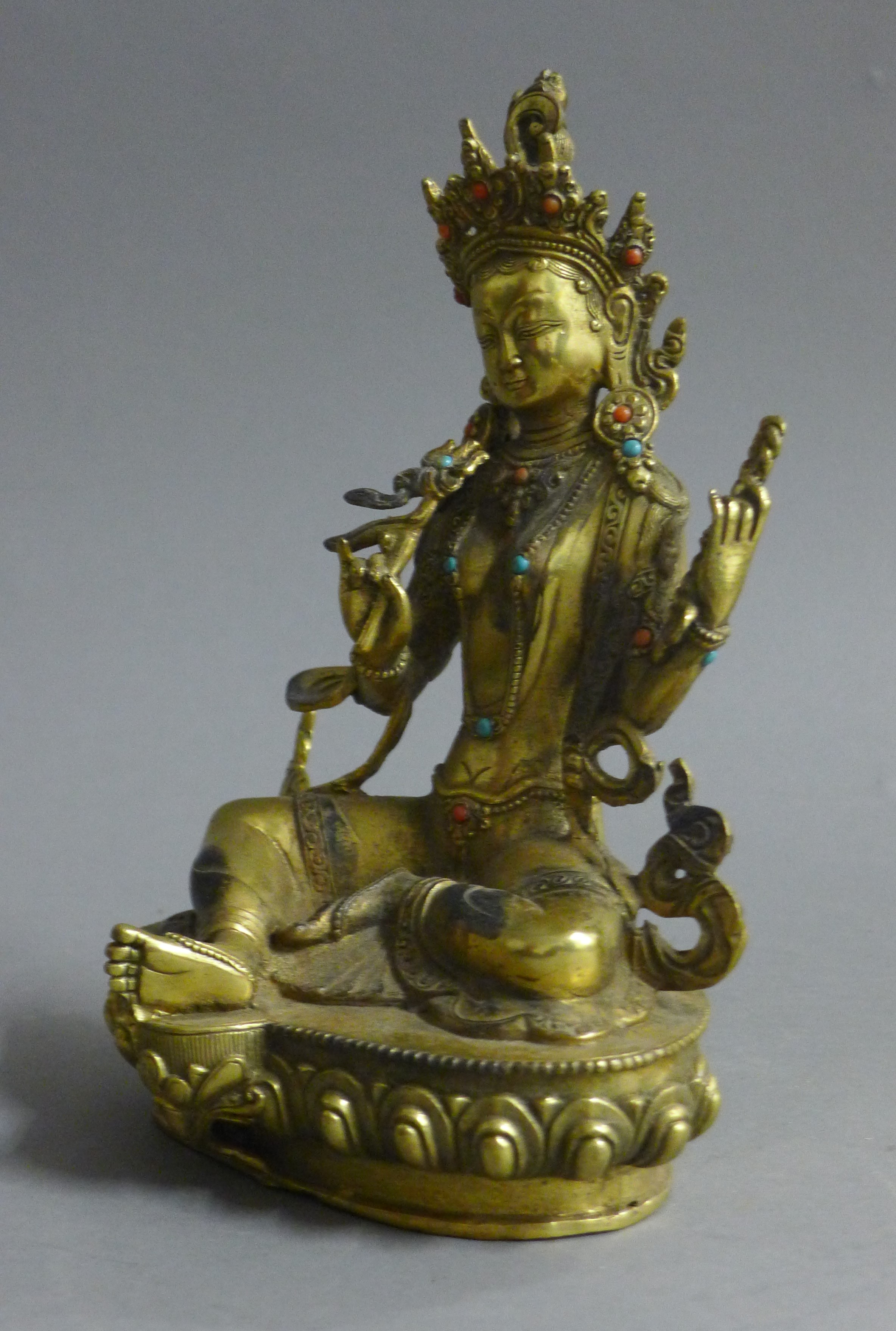 A gilt bronze figure of Buddha decorated with turquoise and coral. 21.5 cm high. - Image 2 of 5