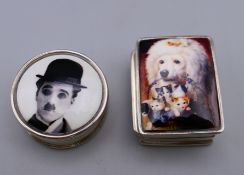 Two small silver pill boxes one depicting Charlie Chaplin,