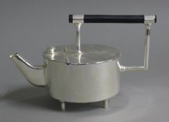 A Christopher Dresser style teapot. 12 cm high.
