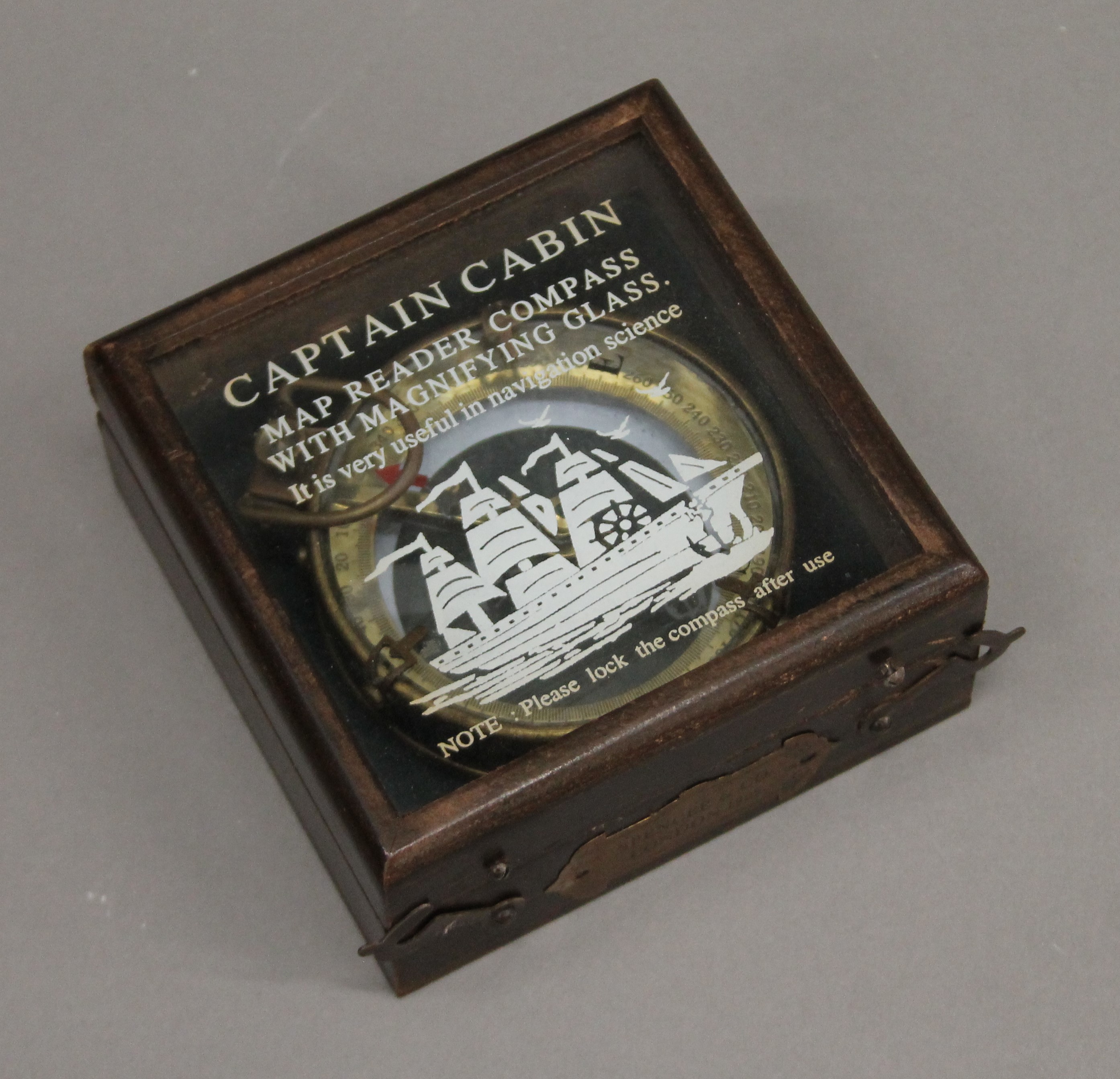 A boxed compass.