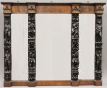 A 17th/18th century and later ornately carved Italian walnut over mantle mirror,
