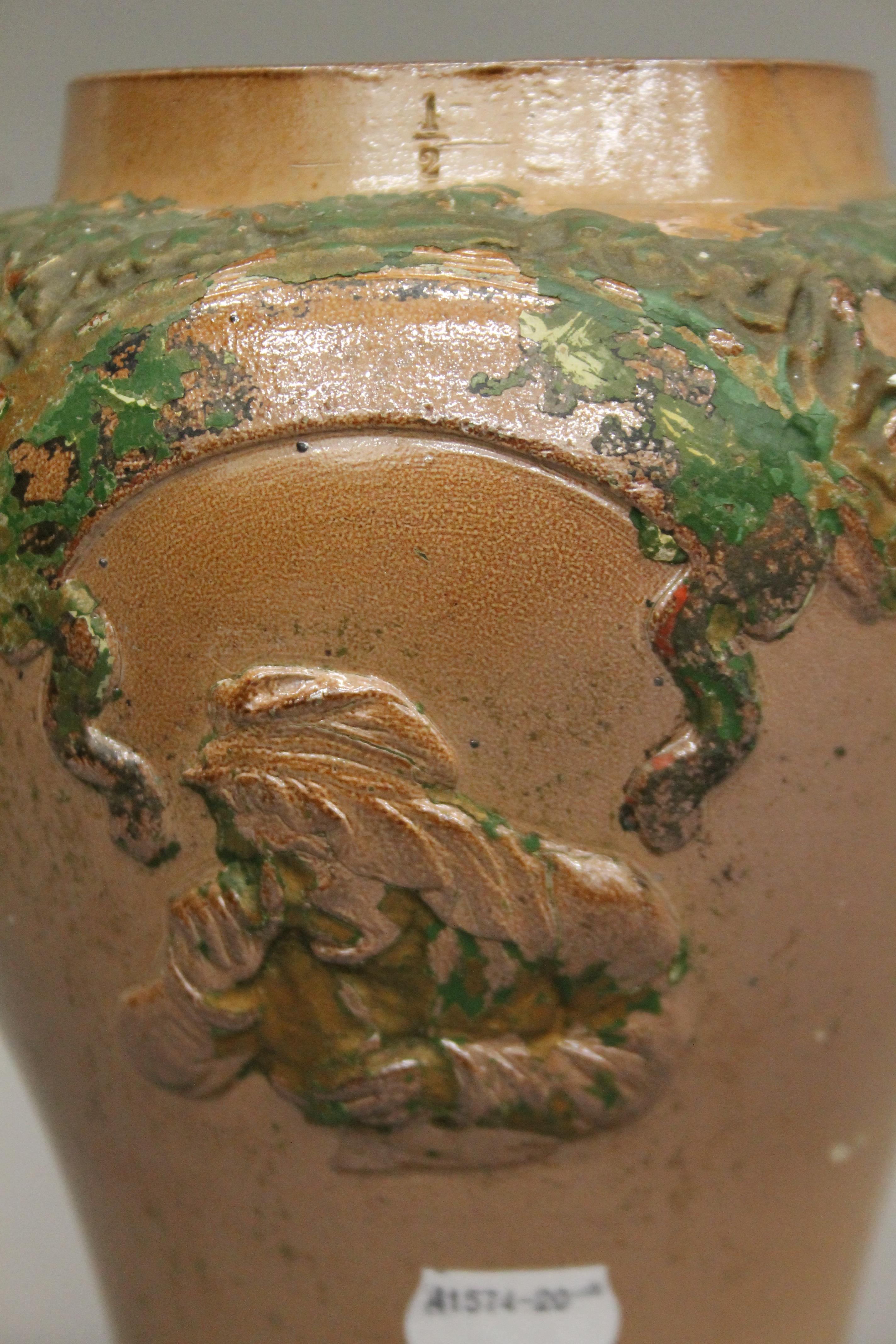 A 19th century stoneware shop snuff jar. 23 cm high. - Image 2 of 3