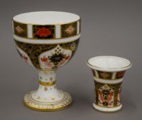 A Royal Crown Derby goblet and a Royal Crown Derby small vase. The former 12 cm high.