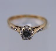 A 9 ct gold 0.25 carat diamond solitaire ring. Ring size K. 1.8 grammes total weight.