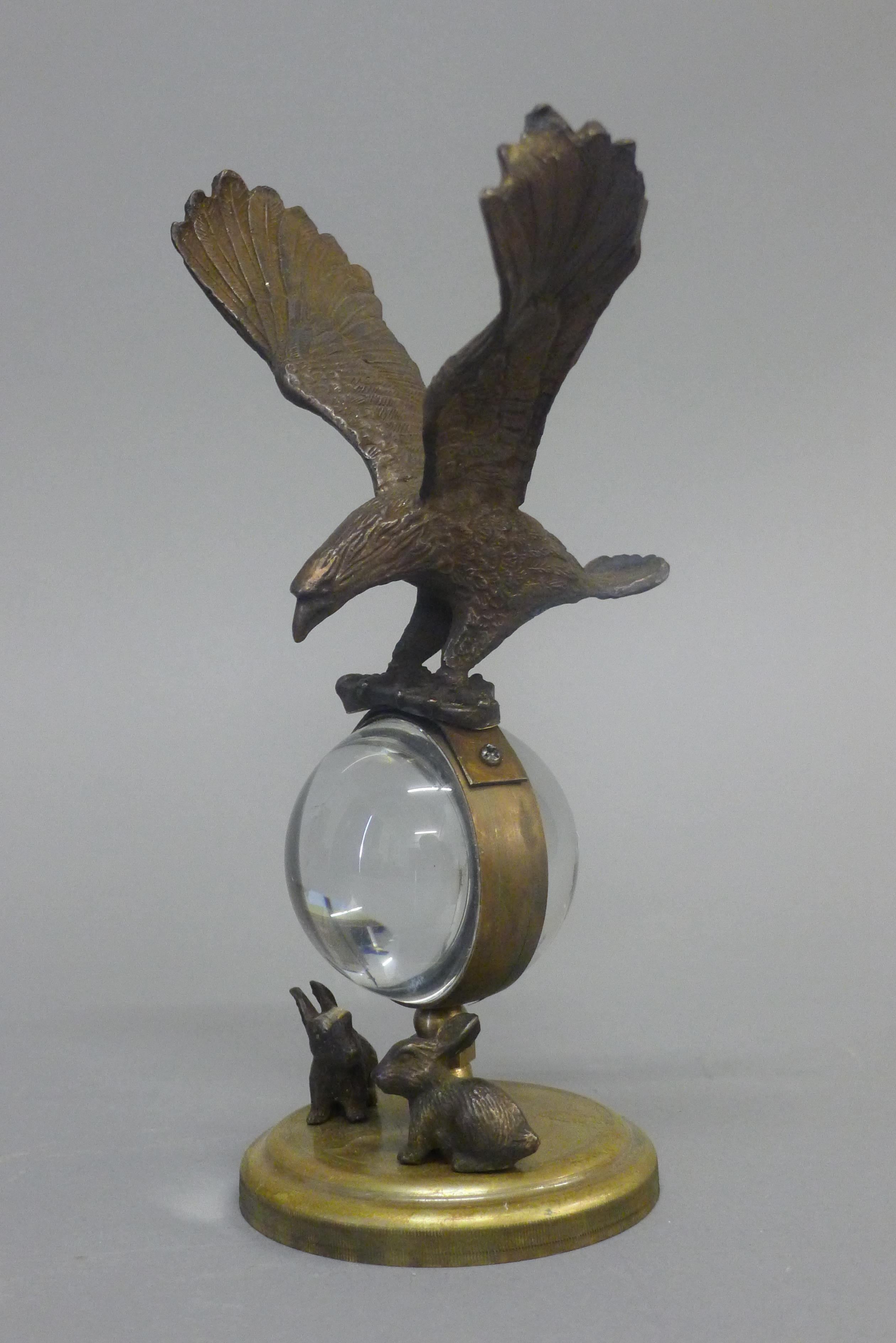 An eagle ball clock. 21.5 cm high. - Image 2 of 4