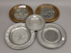 Two framed pewter plaques, etc. The former each 22.5 cm diameter.