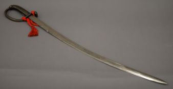 A vintage Eastern sabre. 95 cm long.