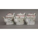 Three Newhall porcelain teapots. Each approximately 25 cm long.