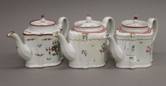 Three Newhall porcelain teapots. Each approximately 25 cm long.