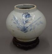 A Korean blue and white porcelain vase of compressed globular form,