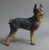 A painted cast iron dog form doorstop. 21 cm high.