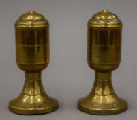 A pair of brass Hennessy's Brandy warmers. 11.5 cm high.