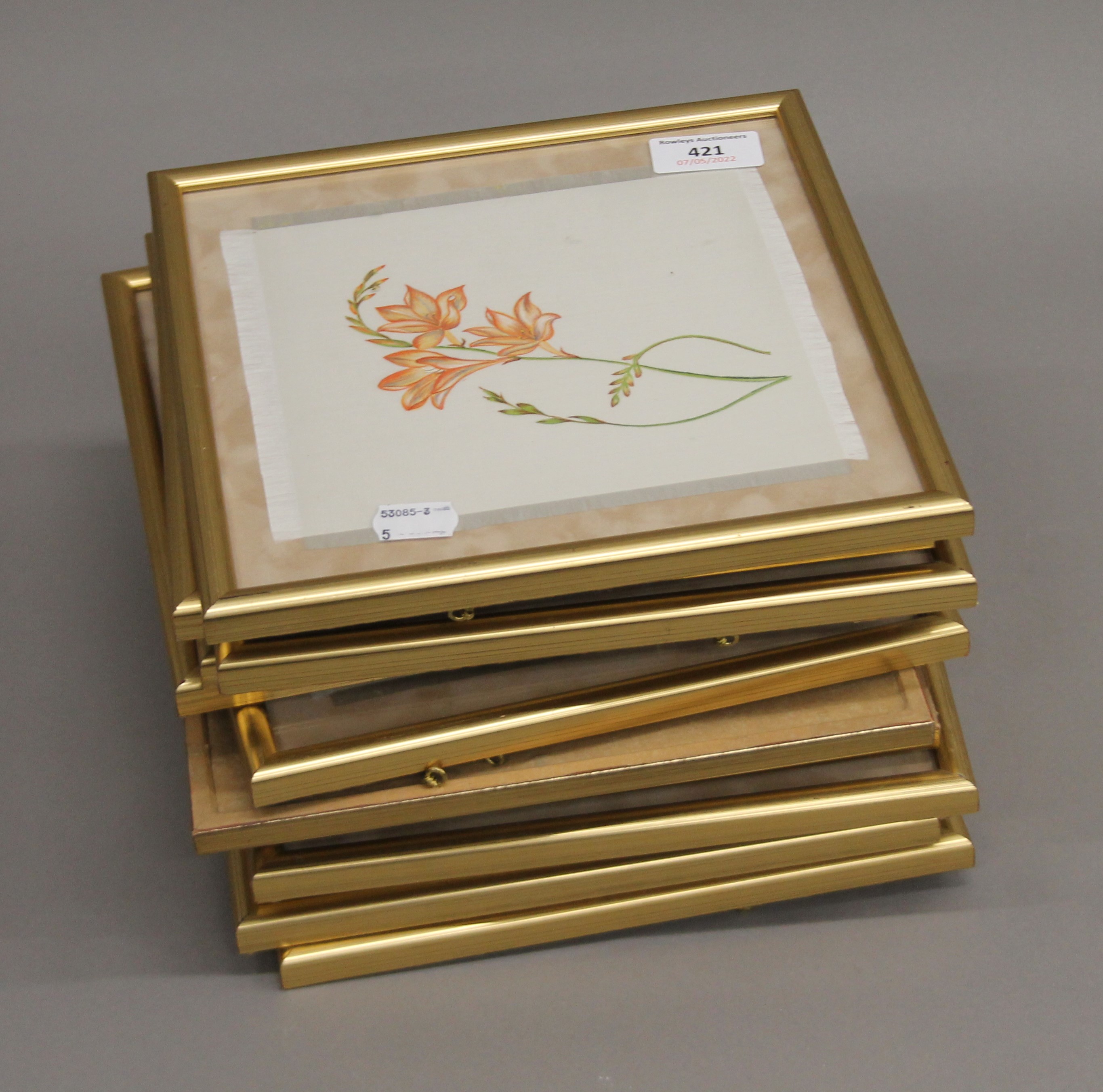 Twelve floral paintings on silk, each framed and glazed. 23 cm squared overall.