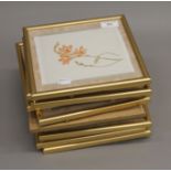 Twelve floral paintings on silk, each framed and glazed. 23 cm squared overall.