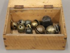 A collection of antique crotal bells.