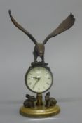 An eagle ball clock. 21.5 cm high.