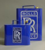 Two Rolls Royce cans. The largest 32 cm high.