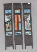 A set of three Chinese reverse painted panels. 18.5 cm wide.