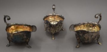 A set of three silver plated sauce boats.