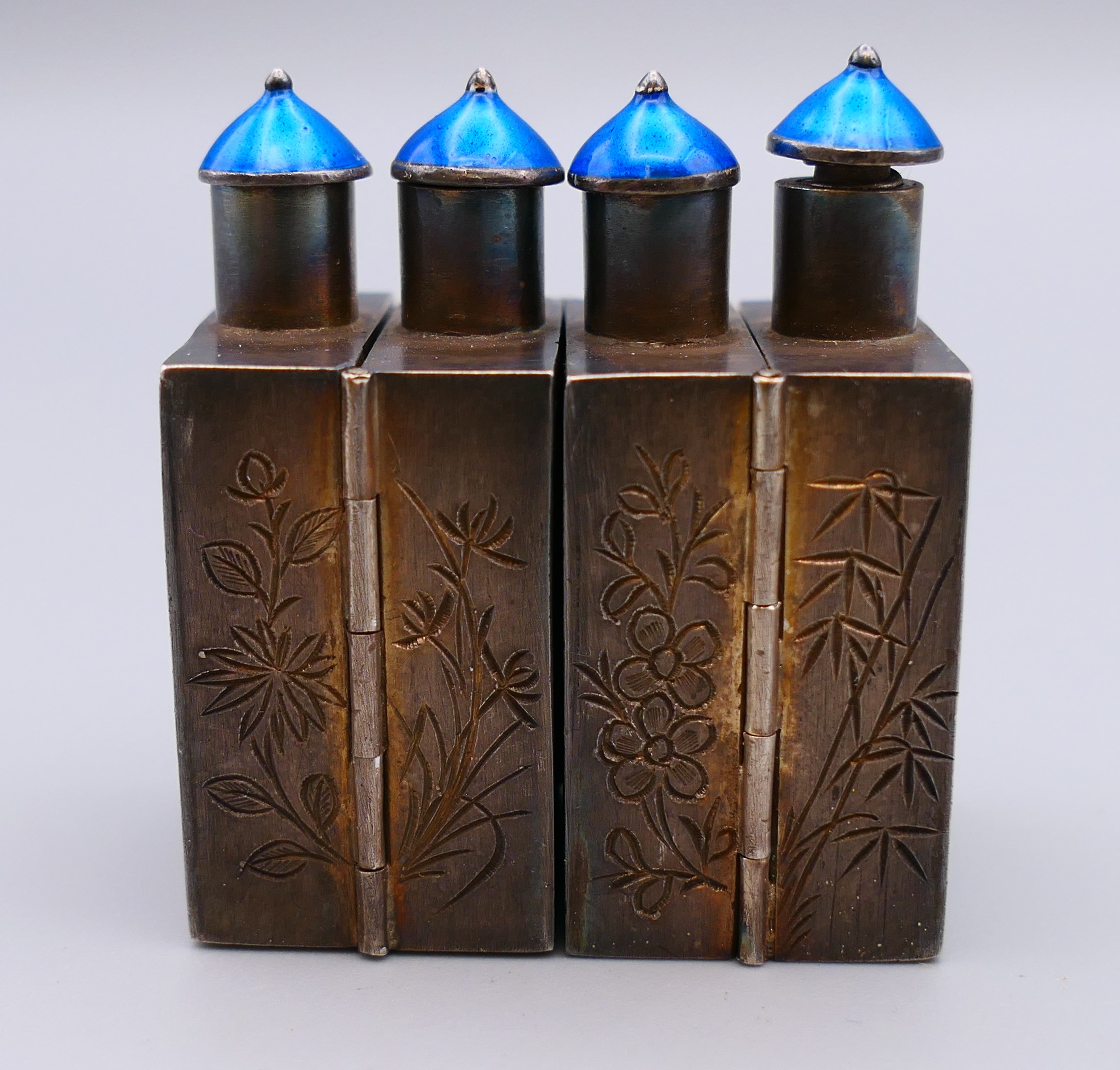 A set of four Chinese silver and enamel folding hinged snuff bottles. 4 cm high, 8 cm long opened. - Image 5 of 9