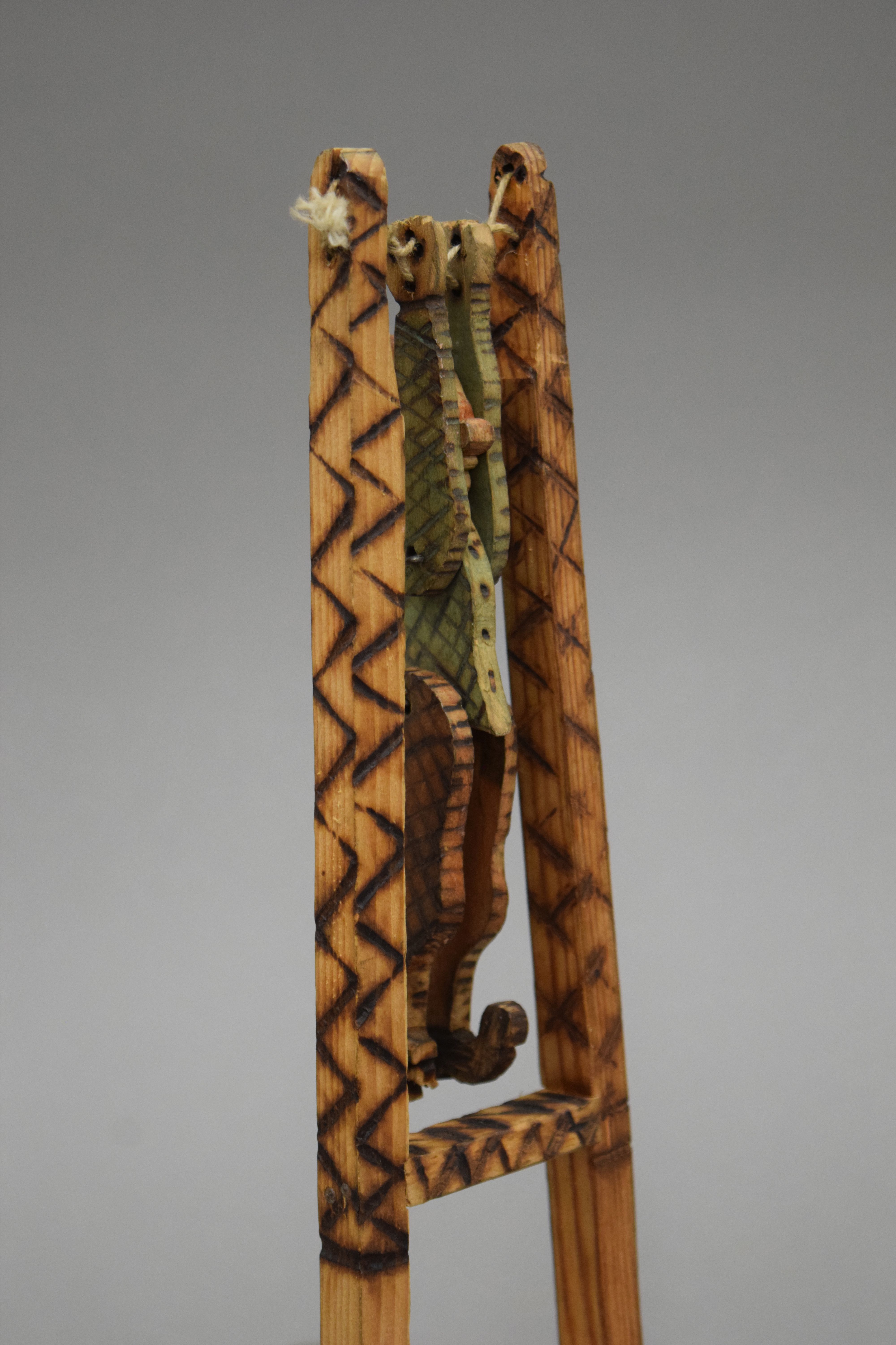 A vintage carved wooden and poker work acrobatic clown toy. 27.5 cm high. - Image 2 of 4